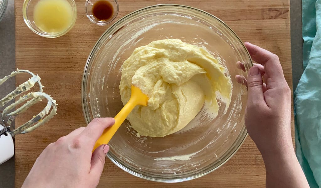 Lemon-Cake-Step-4-Add-eggs-and-scrape