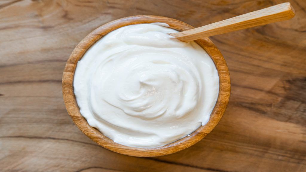 Healthy breakfast with Fresh greek yogurt on background